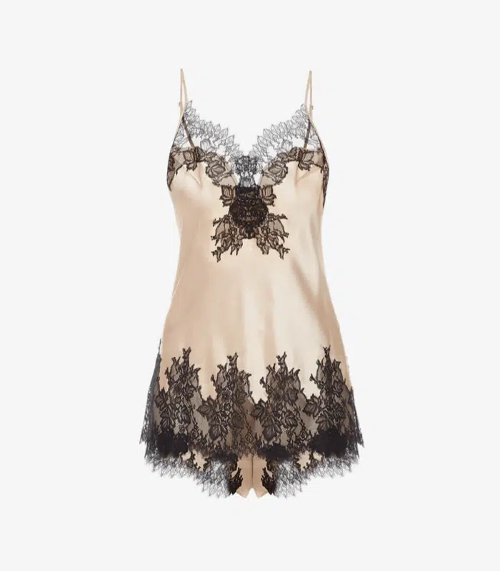 Product shot of the Silk Slip Set, a bias-cut slip dress with lace trim.